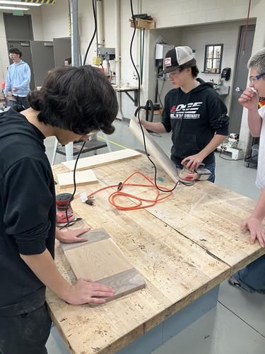 Students are hard at work Completing the Capstone Projects of the semester. We have some Designing and then creating custom Cutting Boards. While others are quickly laying out and framing their scale model buildings. 